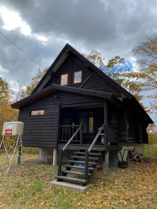 Вилла Besso Log Cabin Нисэко Экстерьер фото