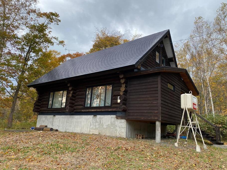 Вилла Besso Log Cabin Нисэко Экстерьер фото